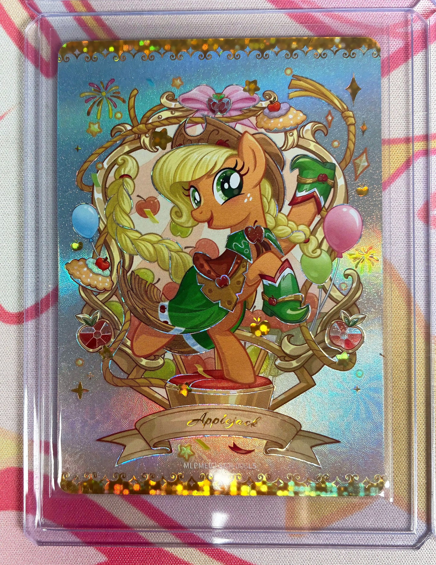 Applejack collectible card, My Little Pony MLPME02-SGR-006, gold-foil full-art with apples