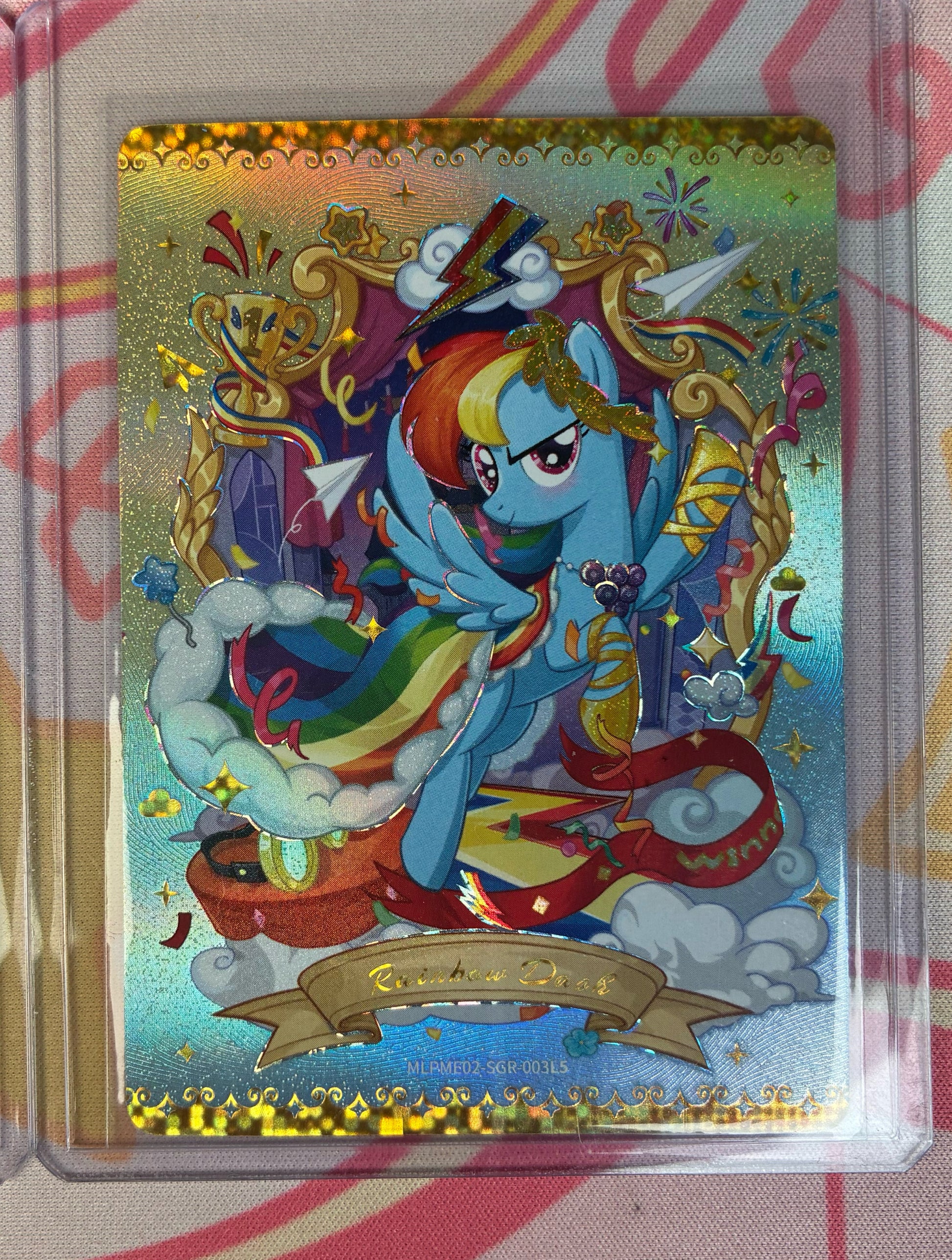 Rainbow Dash collectible card, My Little Pony MLPME02-SGR-003, gold-foil full-art with laurels and trophies