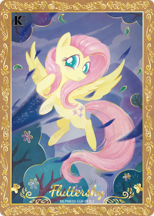 Fluttershy SGR card MLPME03-SGR-013L5, My Little Pony Kayou 1st Print single: Fluttershy flying through a windswept night forest under a crescent moon, ornate gold filigree border